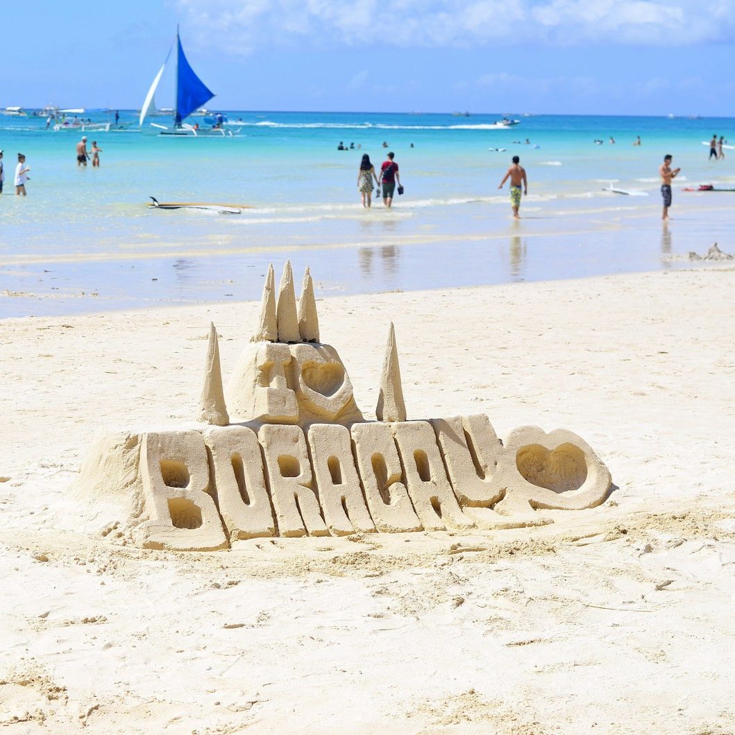 people walking on Boracay beach